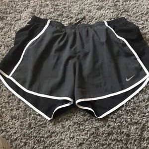 Nike shorts with bun-dies/ lining attached inside